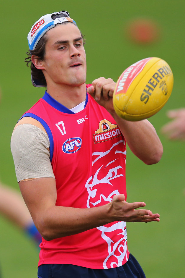 AFL 2016 Training - Western Bulldogs 170516 MELBOURNE, AUSTRALIA - MAY 17: Tom Boyd of the Bulldogs handballs during a Western Bulldogs AFL training session at Whitten Oval on May 17, 2016 in Melbourne, Australia. (Photo by Michael Dodge/Getty Images/AFL Media)